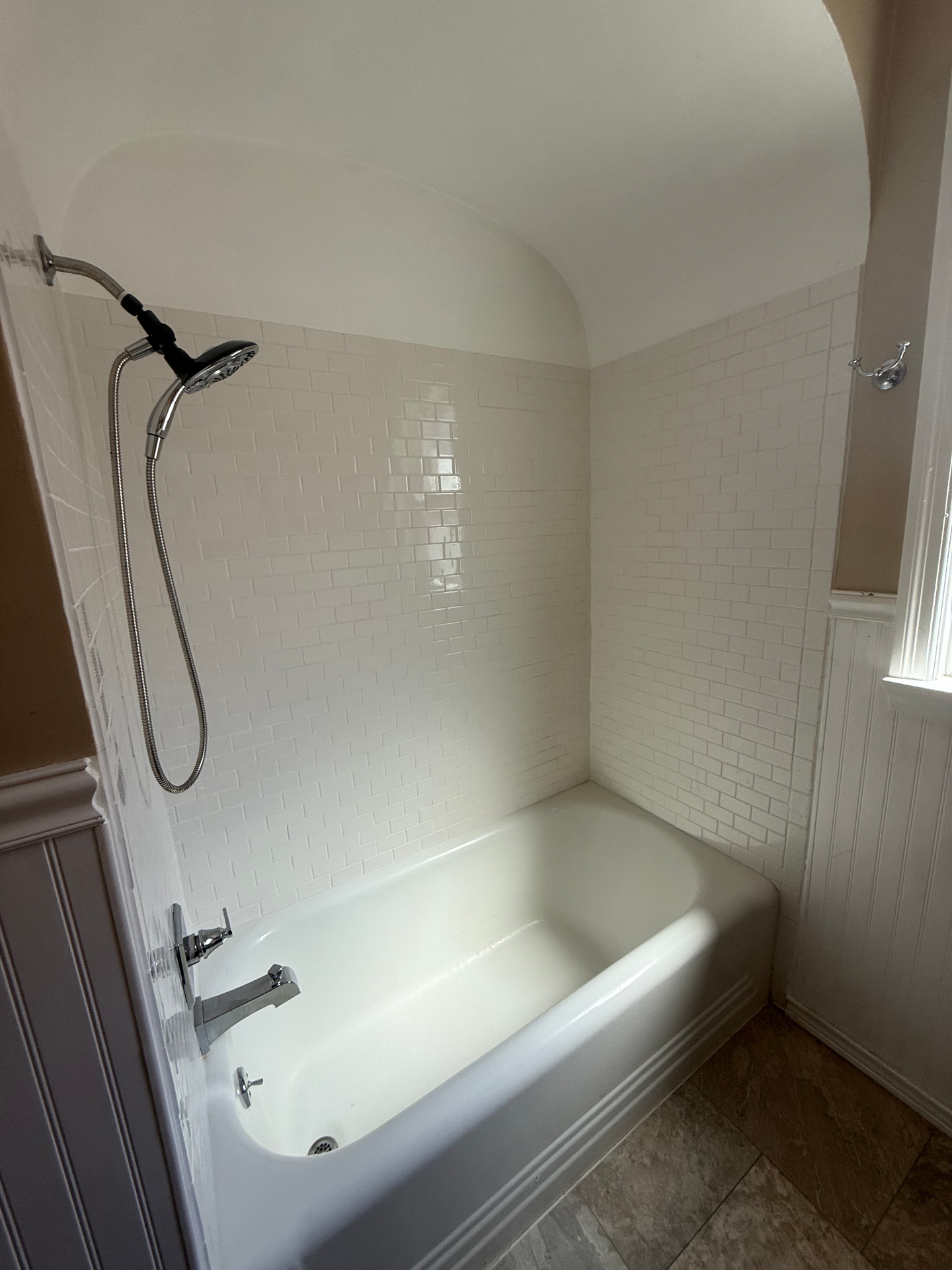 Bathroom tub and shower with subway tile