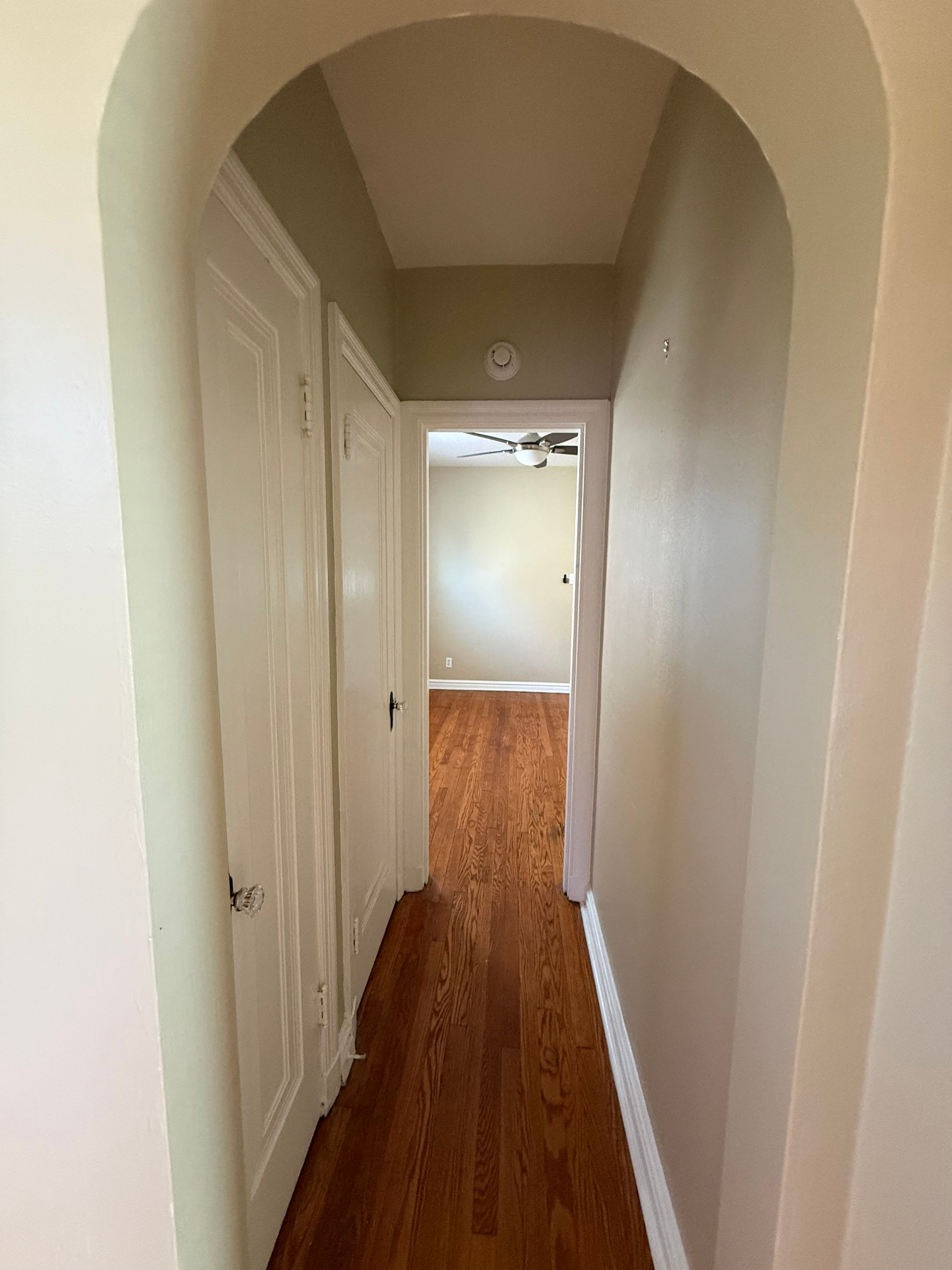 Arched passage to Bedroom 1